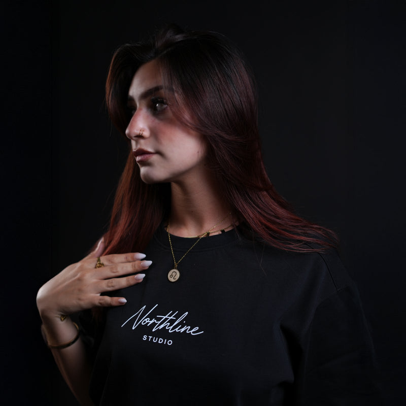 Northline Script Studio Tee in black, oversized heavyweight, front